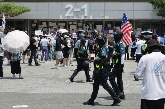 잠실시위대에 체육단체 진입 무산…경찰 "엄중 처리"

서울 송파구 올림픽공원 핸드볼경기장을 점거 중인 시위대와 대한체육회 산하 체육단체 직원들의