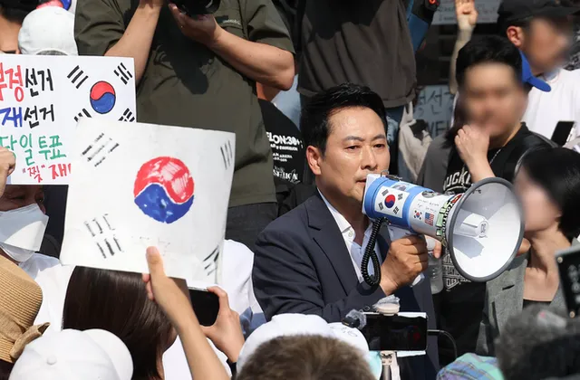 체육회 잠실개표소 진입 '불발'...국힘 중재나섰지만 '1명' 온몸 저지

유승민 대한체육회장을 비롯한 대한체육회 산하 체육단체 관계자들이