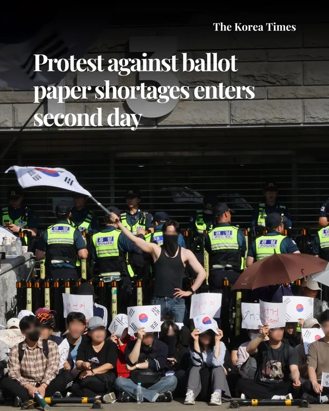 Protests over ballot shortages entered their second day Saturday, with thousands